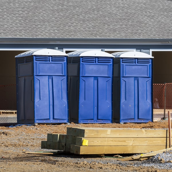 what is the cost difference between standard and deluxe portable restroom rentals in Mount Clare Illinois